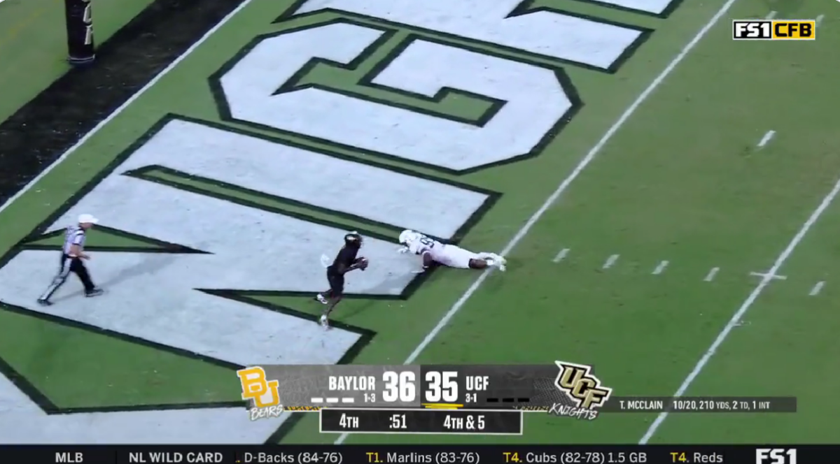 Eric Collins’ voice nearly broke as he called this improbable UCF 4th-down conversion