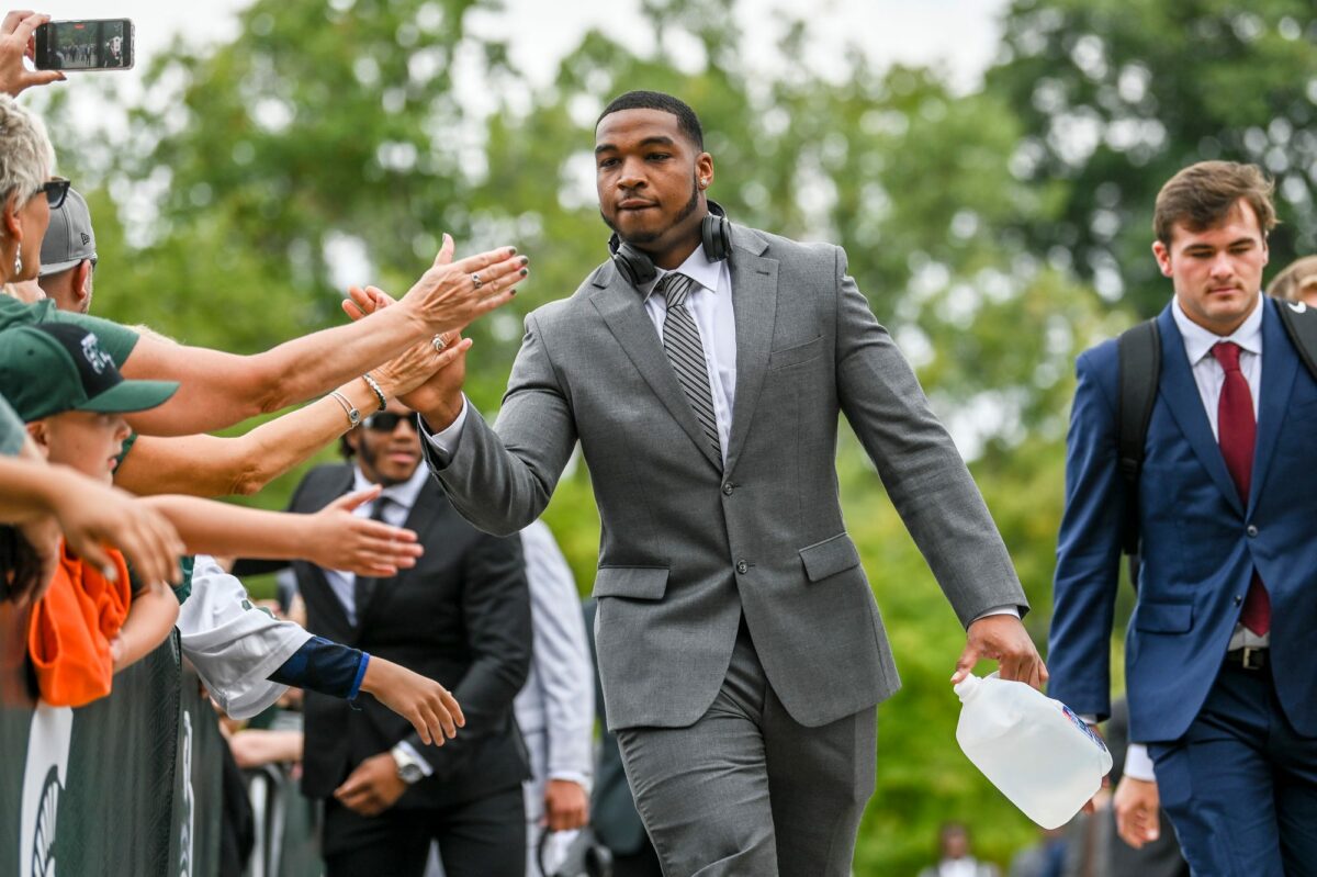 Michigan State football acting head coach Harlon Barnett brings back old game day tradition