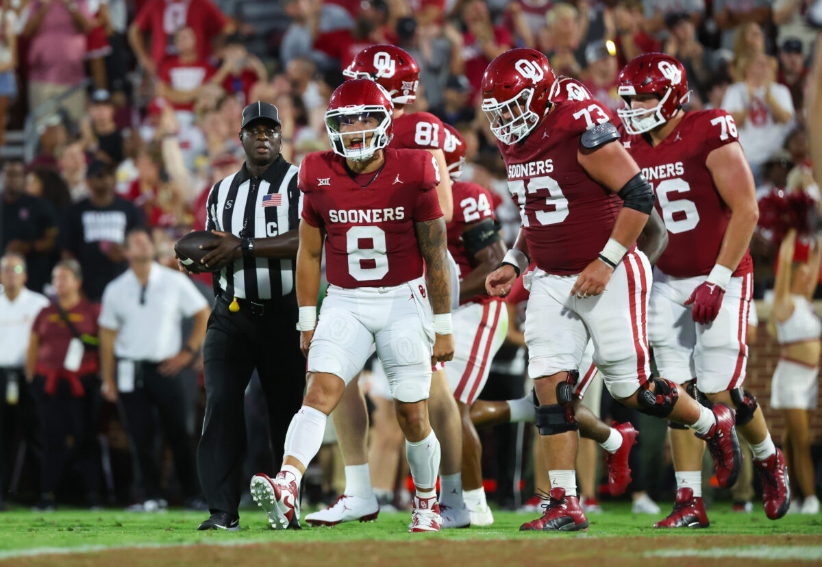Sooners offense shines, defense settles in as Oklahoma beats the Iowa State 50-20