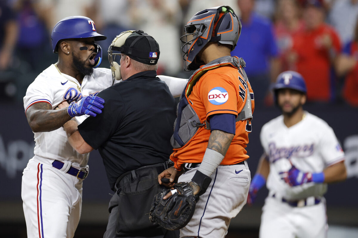 The Rangers – Astros brawl after Adolis Garcia was hit by pitch in 6 photos