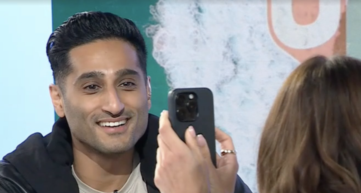Kay Adams took away Shams Charania’s phone during her show and he’s never looked more stressed