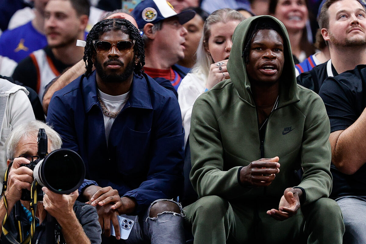 WATCH: Travis Hunter and Shedeur Sanders share moment with LeBron at Nuggets game