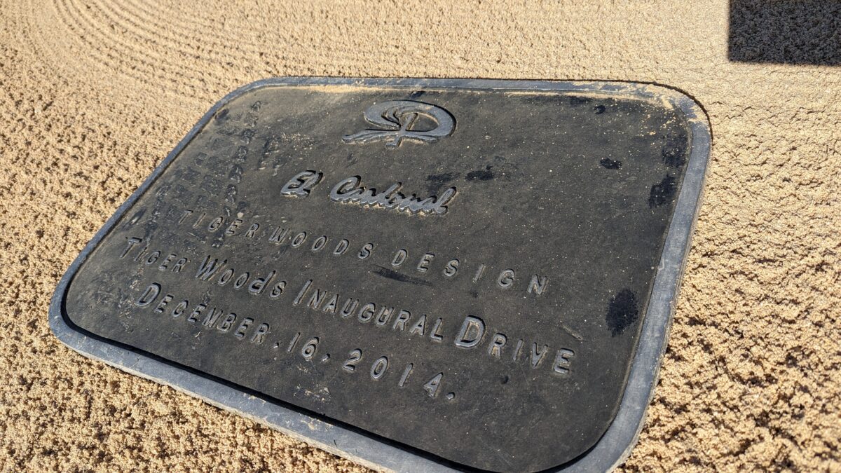 Why is there a plaque in a bunker at Tiger’s Cabo course and where did it go during the World Wide Technology Championship?