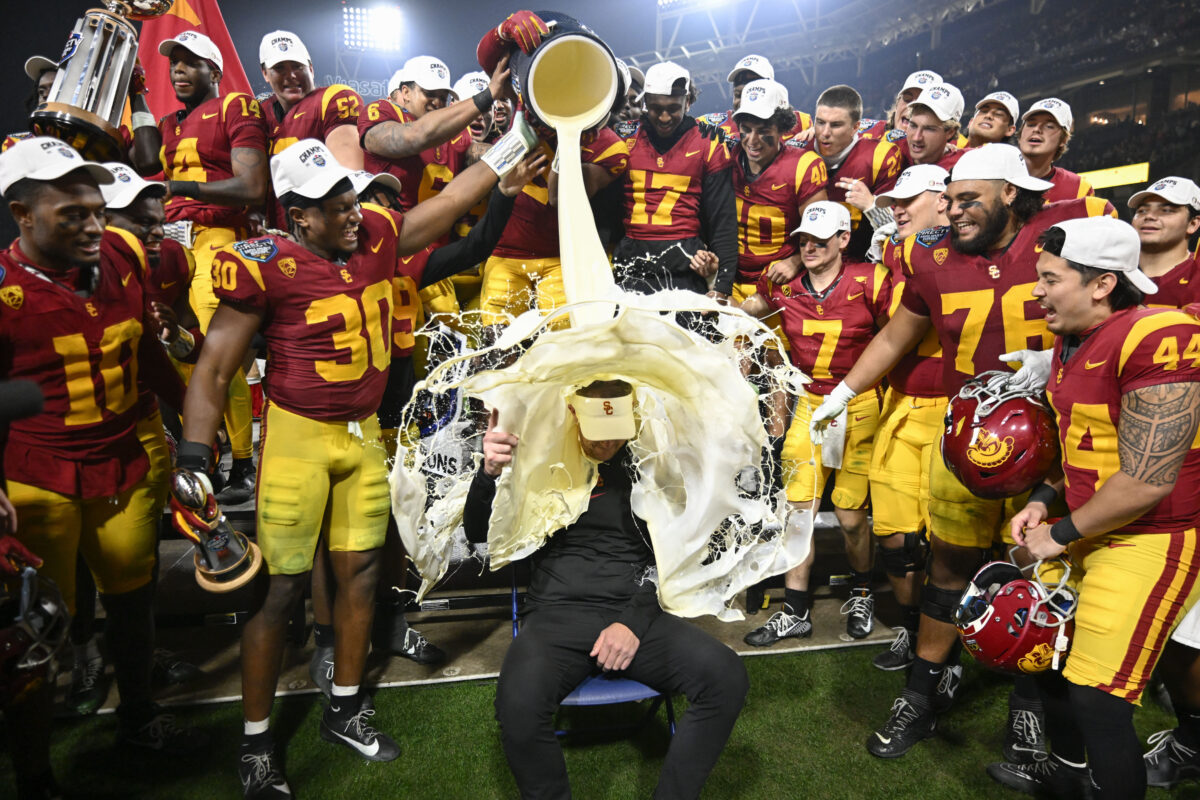 9 photos of Lincoln Riley taking the inaugural egg nog bath after USC’s Holiday Bowl win