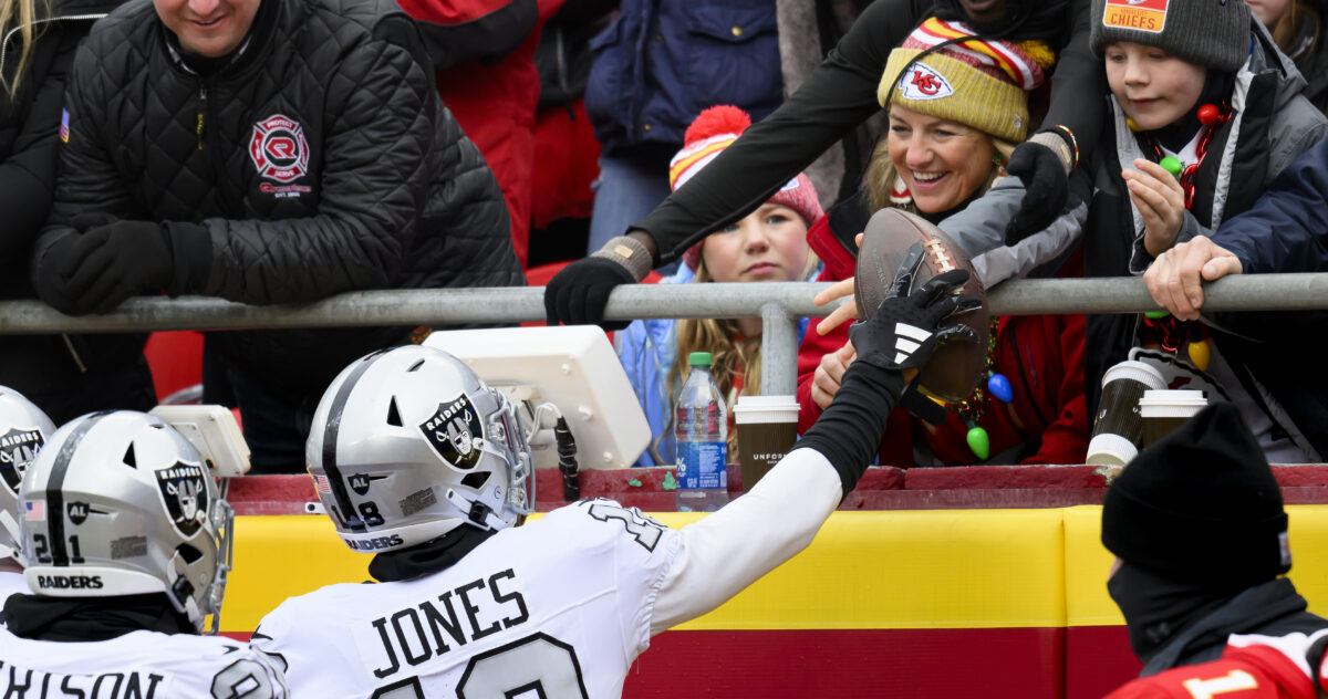 Fans were in disbelief after Raiders CB Jack Jones appeared to pull a football away from a young Chiefs fan