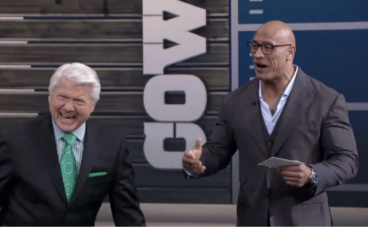 The Rock surprised Jimmy Johnson on the Fox NFL pregame show to fulfill a promise from their Miami days