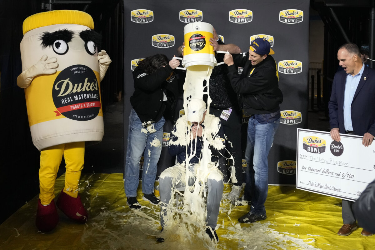 West Virginia coach Neal Brown earns mayo bath with bowl win