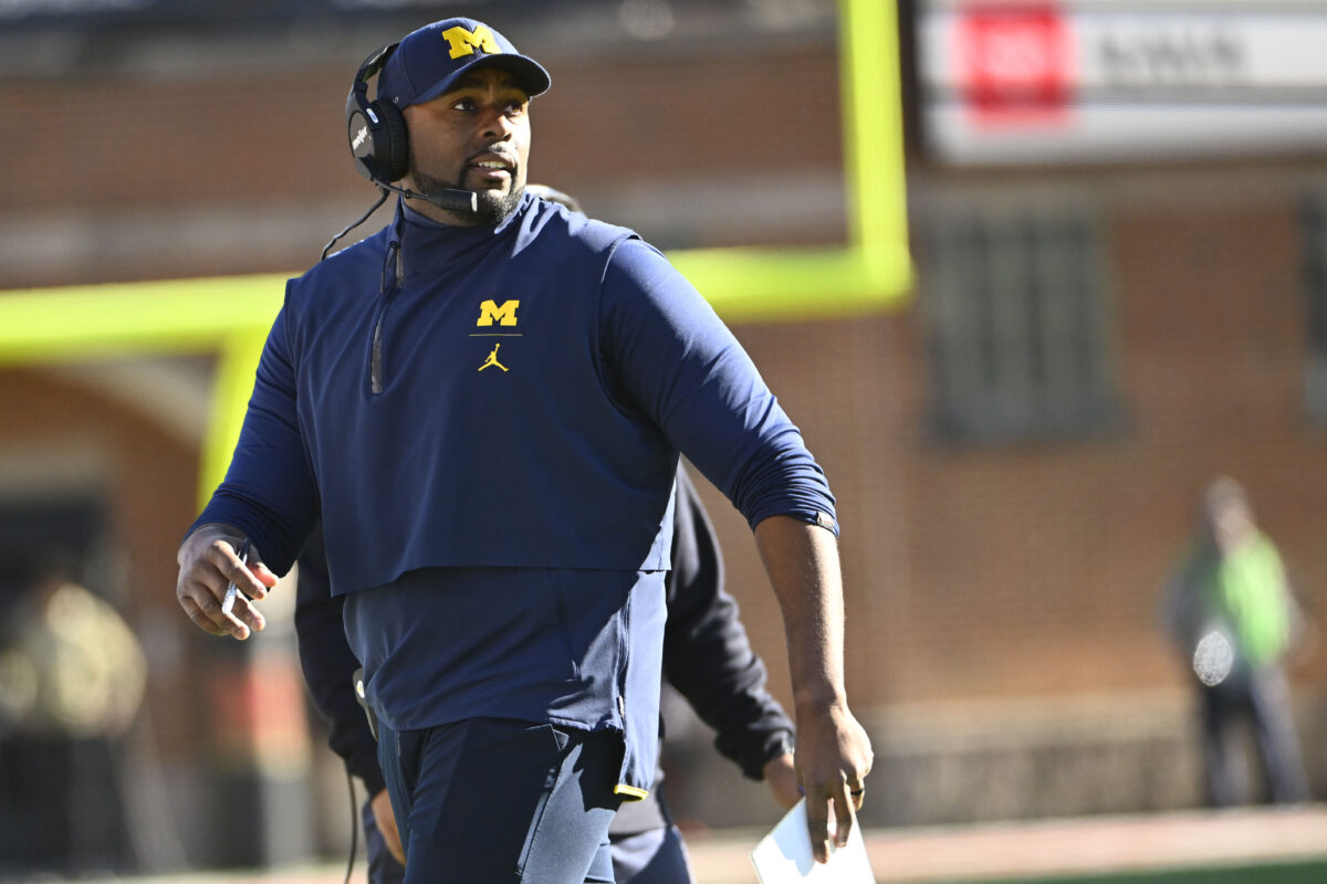 Michigan offensive coordinator Sherrone Moore is the frontrunner to replace Harbaugh