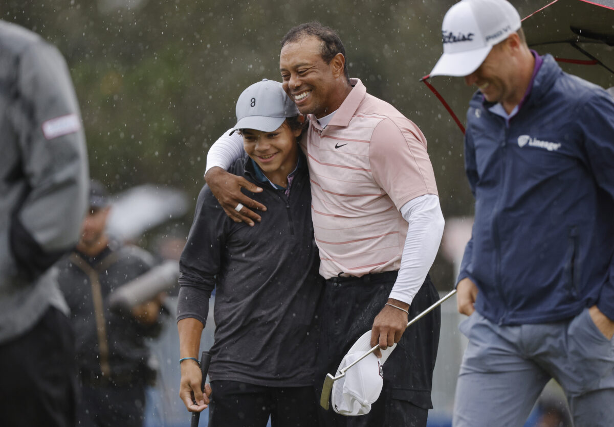 Tiger Woods protecting Charlie from questions, unruly fans shows he’s a dad first