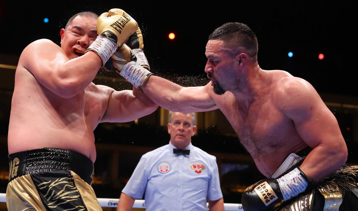 Joseph Parker survives two knockdowns to outpoint Zhilei Zhang