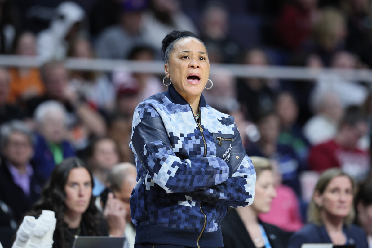 Dawn Staley rocked a fresh Louis Vuitton zip-up while coaching in the Sweet 16