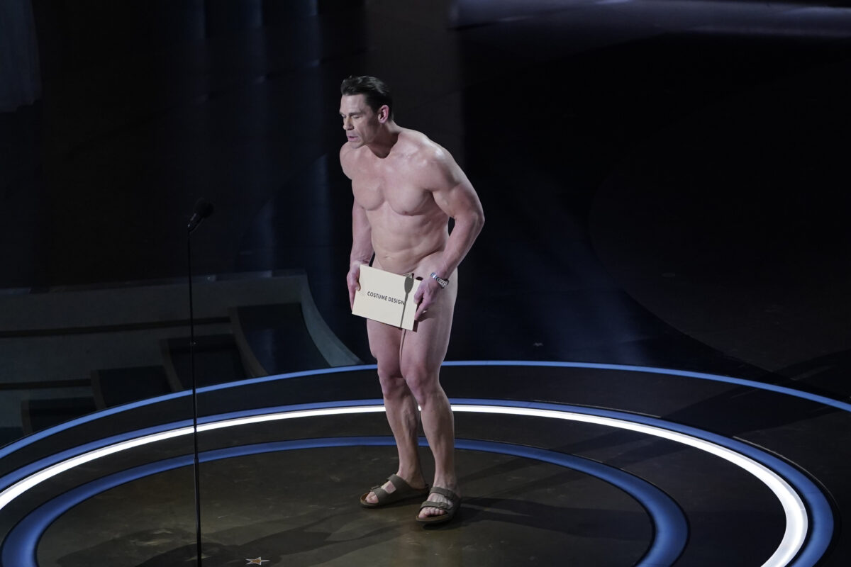 Watch: John Cena walks onstage naked at the Oscars, talks up the importance of costumes