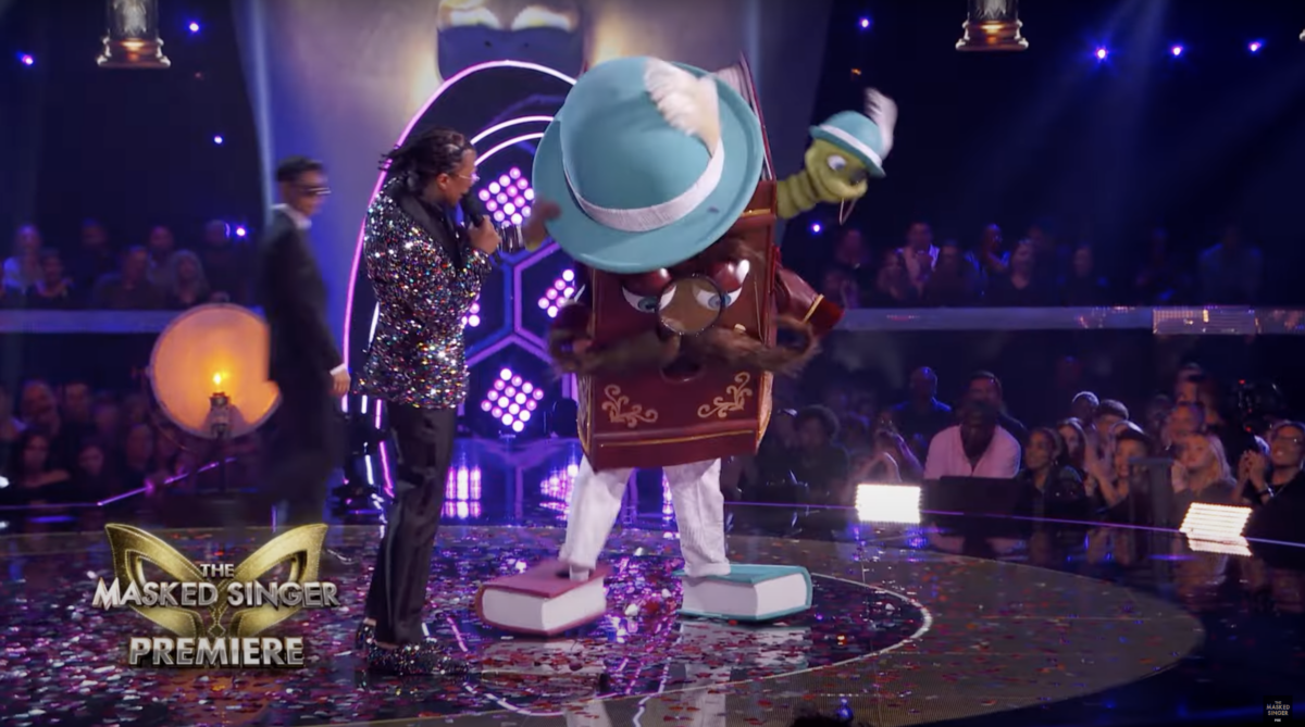 Who was unmasked on the season 11 premiere of The Masked Singer?
