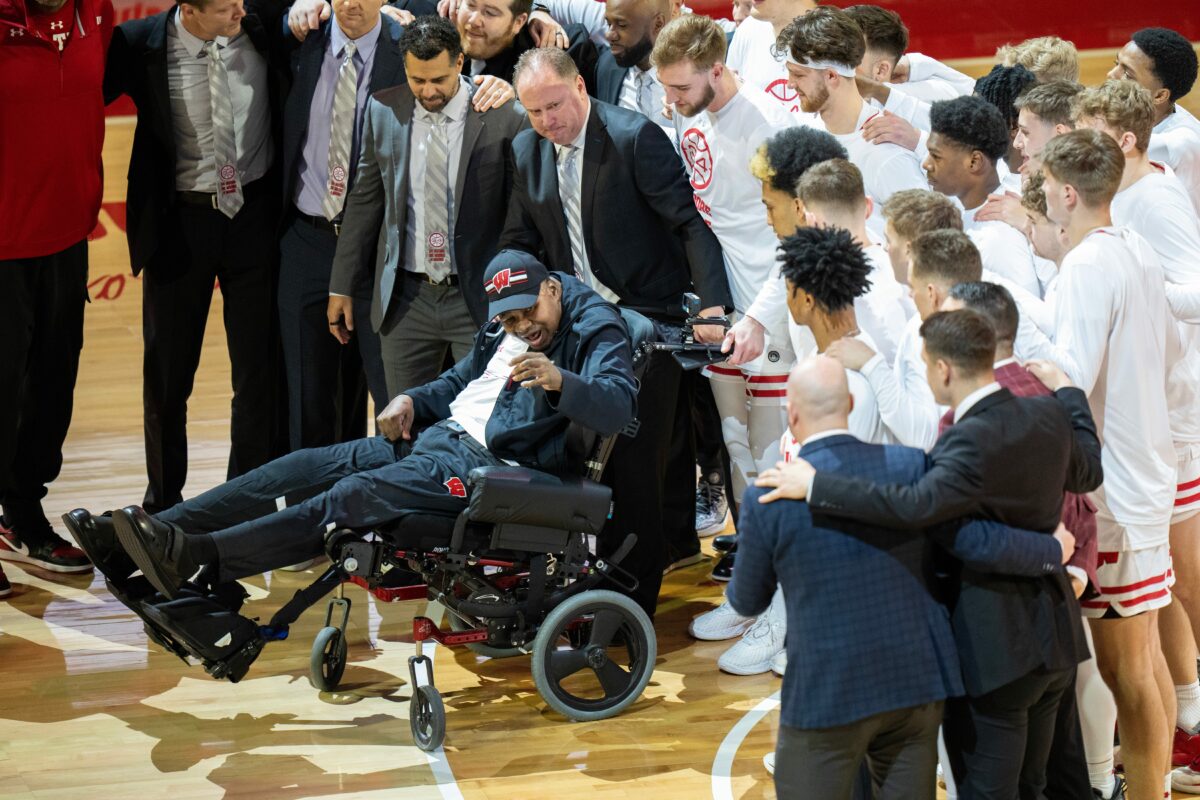 Wisconsin faithful, college basketball world react to Howard Moore’s emotional return to Kohl Center