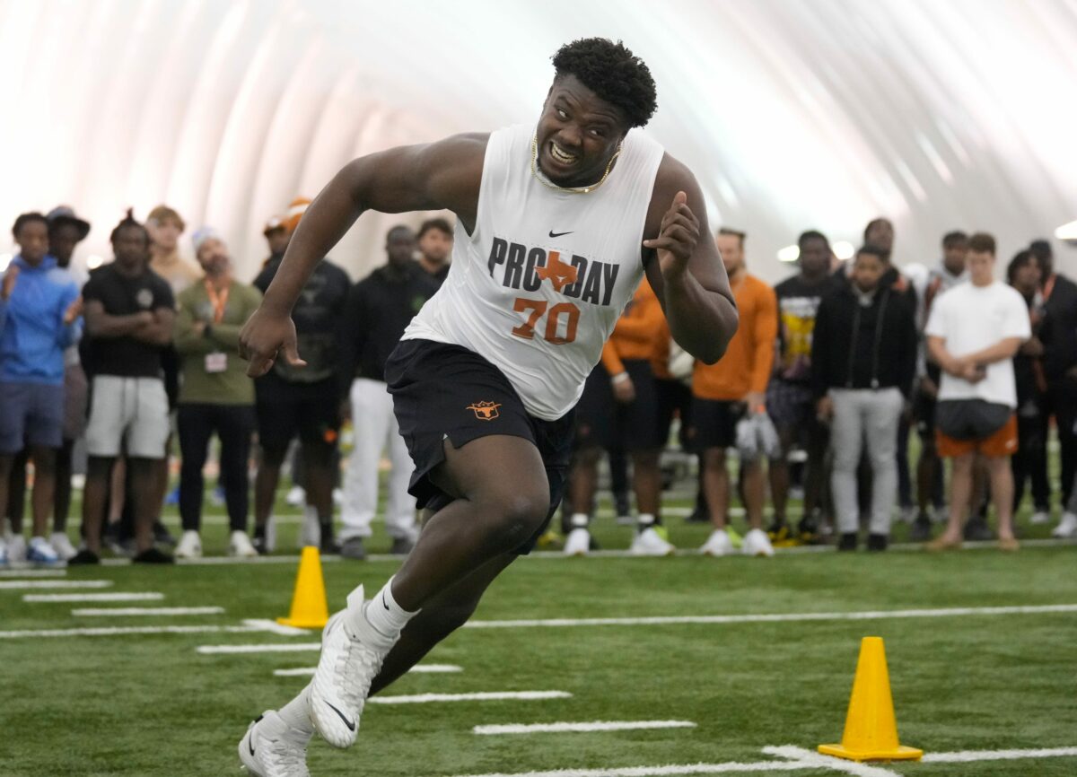Texas RT Christian Jones gets hands-on work with Saints coach at pro day
