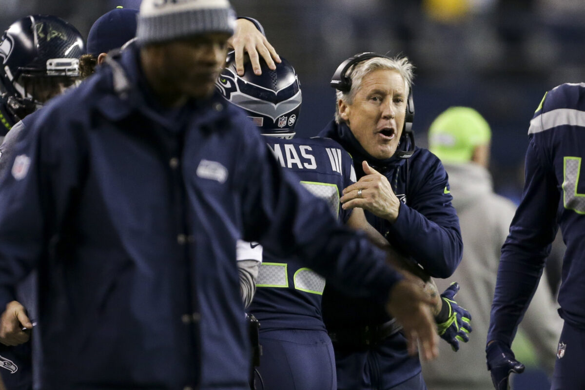 Pete Carroll coaching up rookie Earl Thomas is a blast from the past