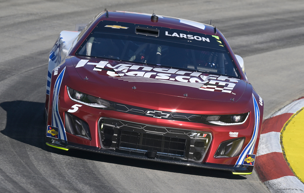 Larson rockets to Martinsville pole, barely edging Wallace