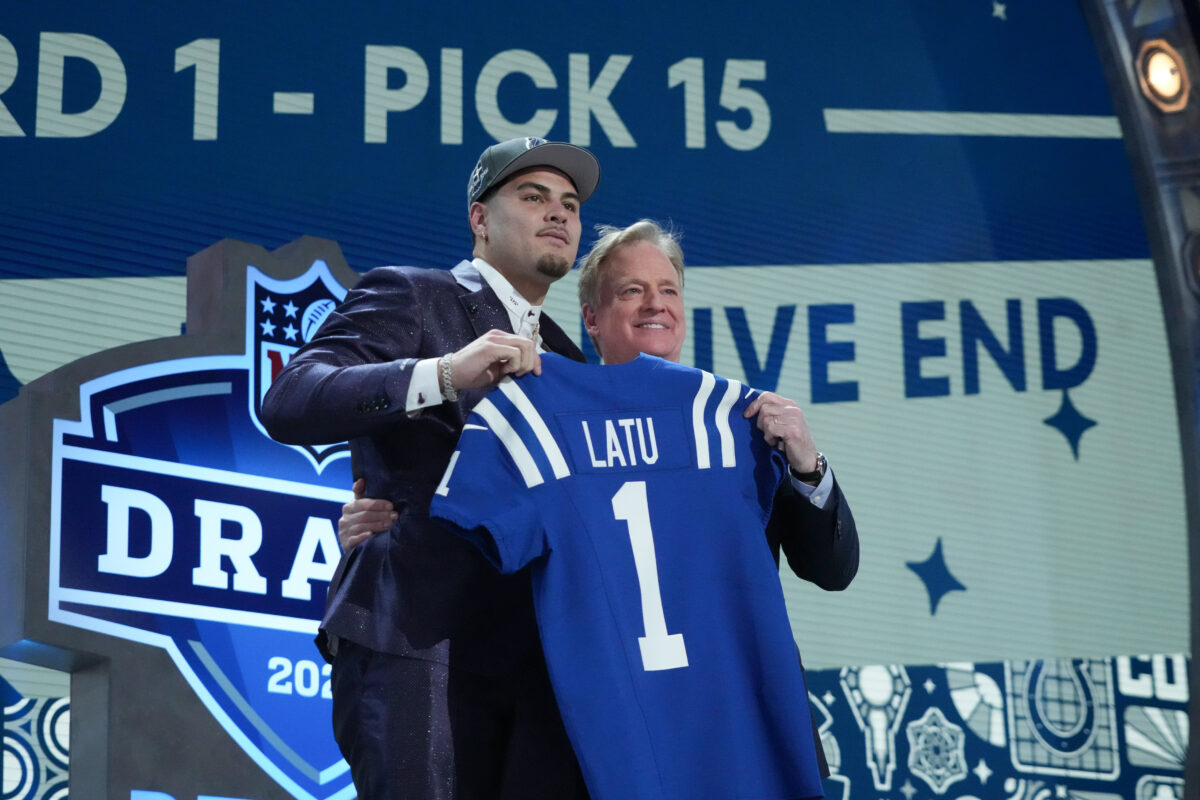Photos of UCLA star Laiatu Latu at 2024 NFL Draft