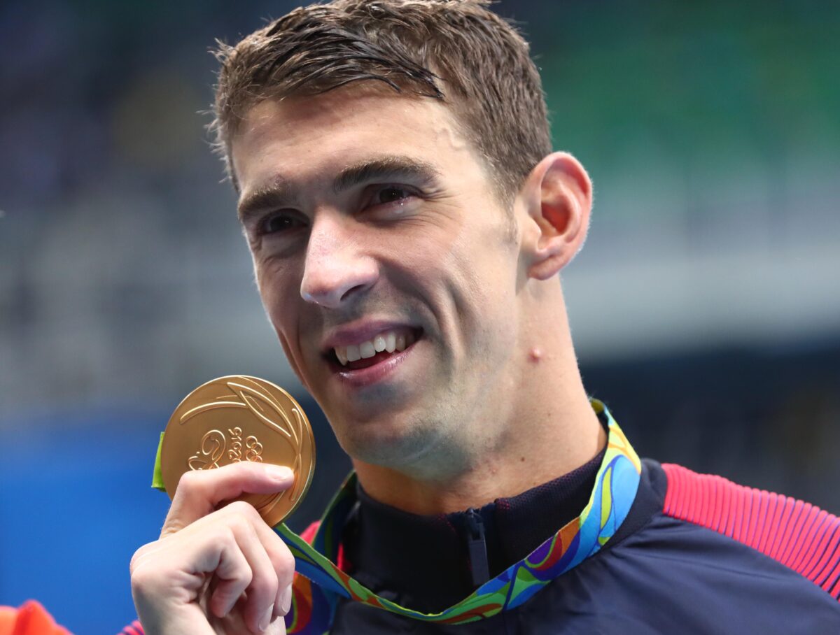 Michael Phelps loved that he was Caitlin Clark’s screensaver on her phone