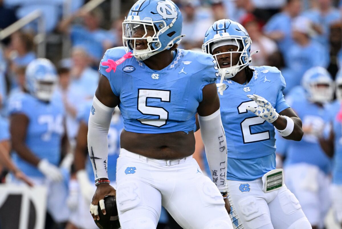 UNC lineman Jahvaree Ritzie hilariously stiff-armed Virginia’s QB during a glorious 84-yard pick-6