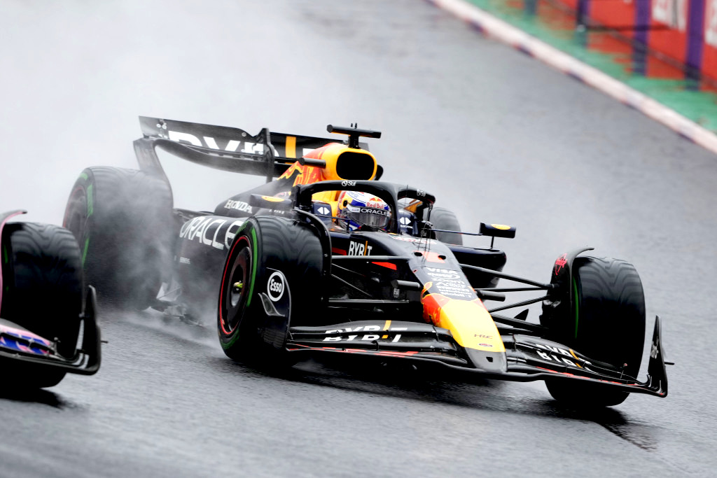 Verstappen streams past 14 cars to win drenched Sao Paulo GP