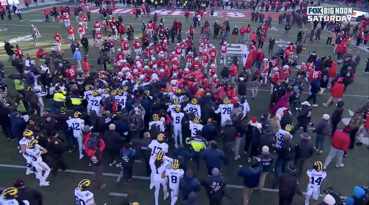 Ohio State and Michigan players brawled at midfield after the Wolverines’ massive upset