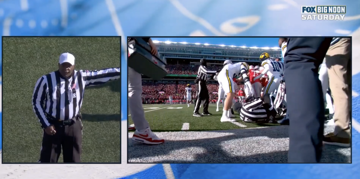 An Ohio State-Michigan sideline scuffle knocked a ref to the ground