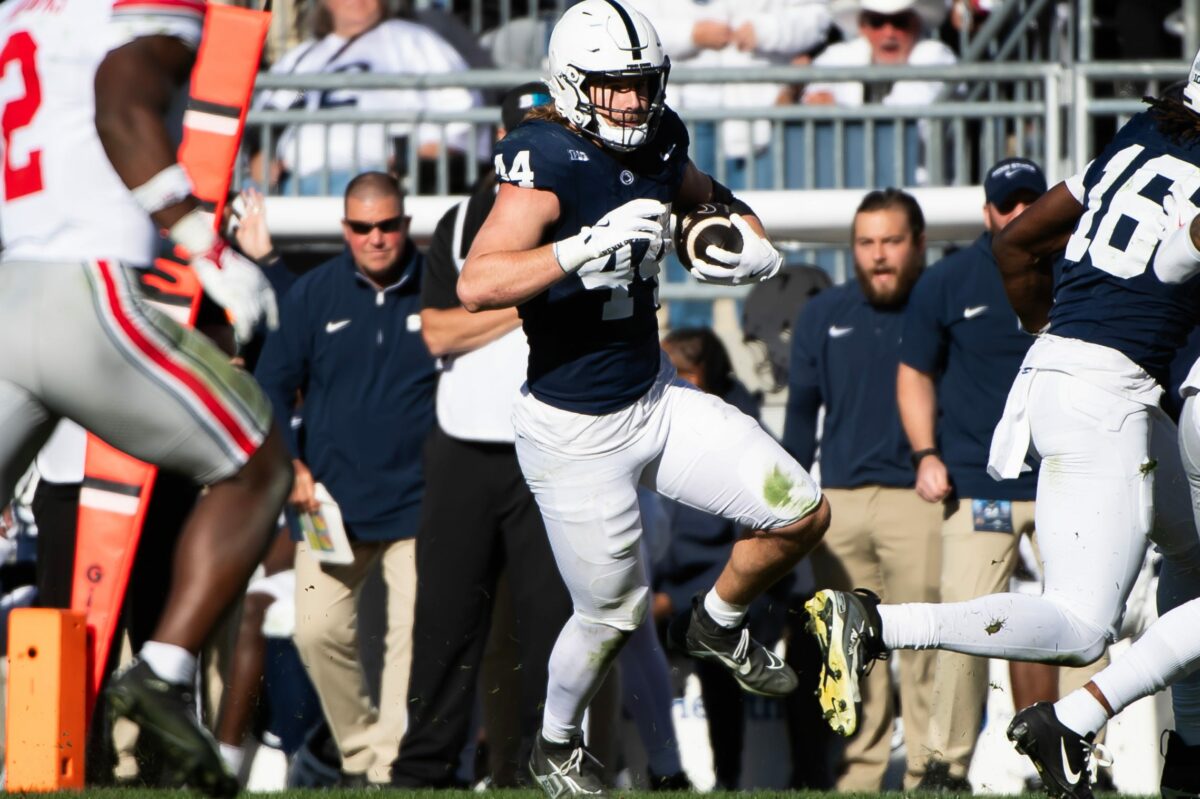 Tyler Warren goes over the top for a Penn State touchdown against Washington