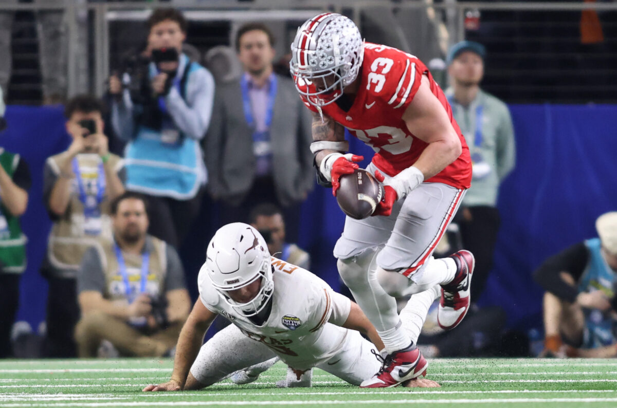 Ohio State’s Jack Sawyer sealed a Cotton Bowl win by strip-sacking former roommate Quinn Ewers and scoring a TD